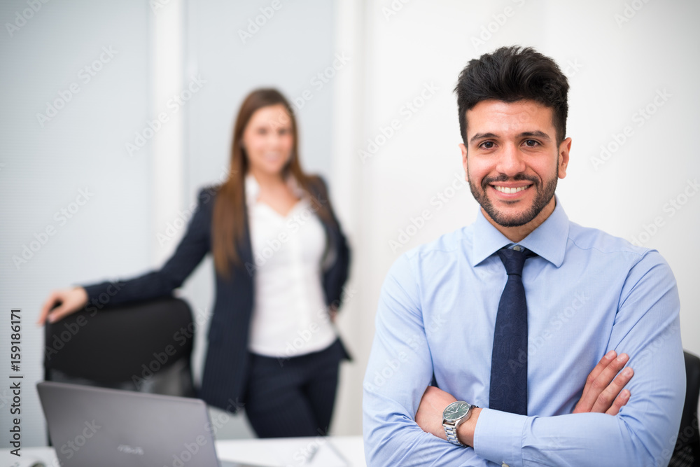 Portrait of a smiling businessman in his office Portrait of a smiling businessman in his office