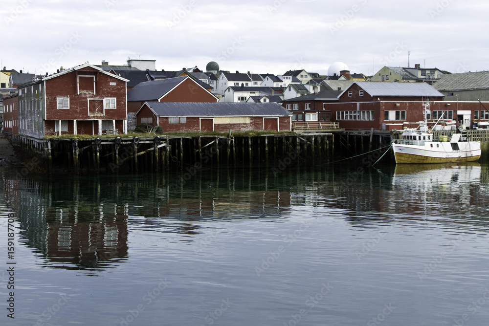Dock and buildings along the harbor of the fishing vilage Vardo, Norway