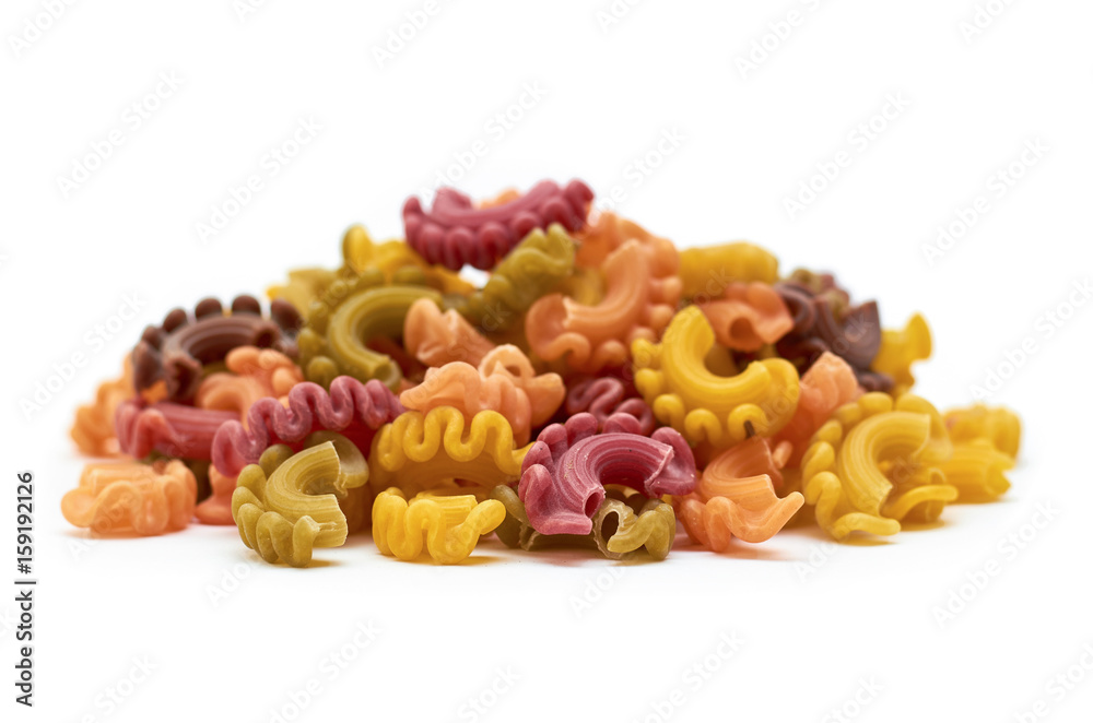 background of raw colored macaroni. Isolated on white background background of raw colored macaroni. Isolated on white background