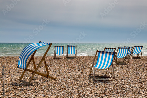 Deck Chairs on a Beach © lemanieh