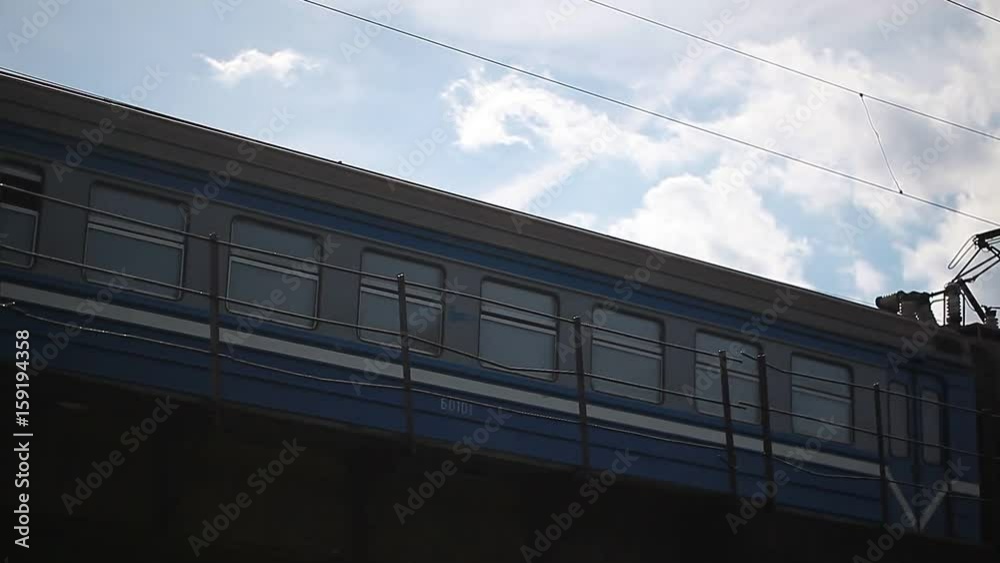 video freight train rides over the bridge over the river. View from below video freight train rides over the bridge over the river. View from below