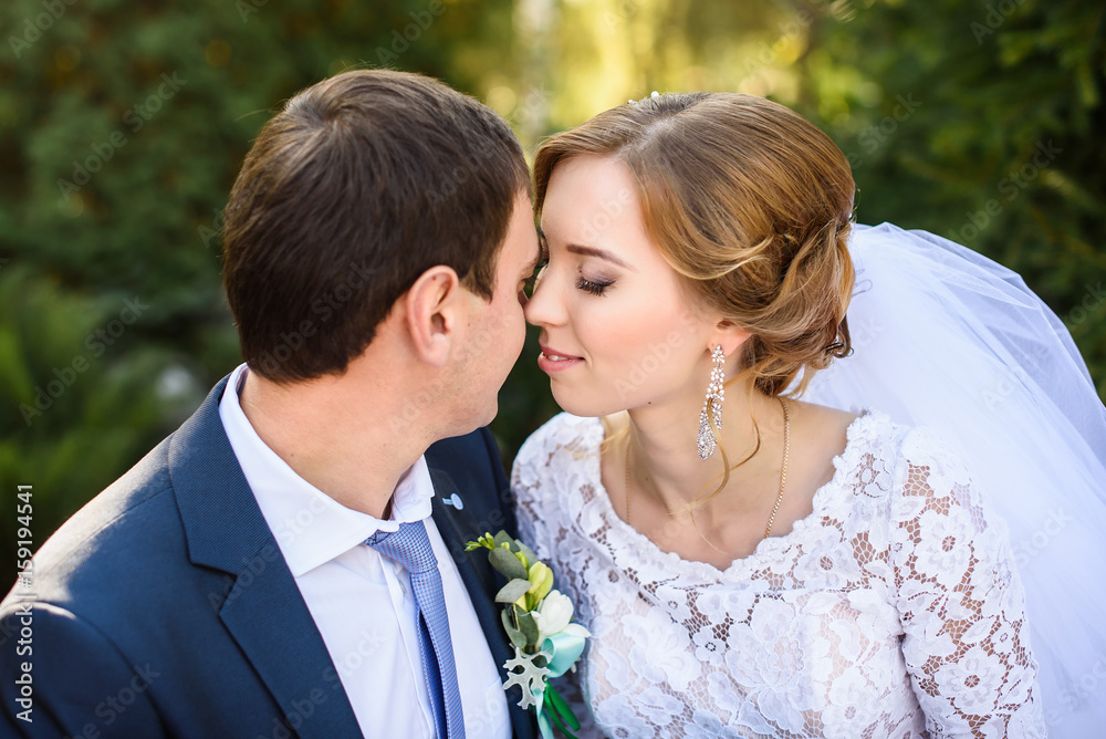 Sensual portrait of a young couple. Wedding photo outdoor Sensual portrait of a young couple. Wedding photo outdoor