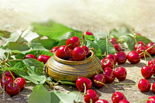 Organic cherry in rustic bowl - refreshing and juicy berry fruit 