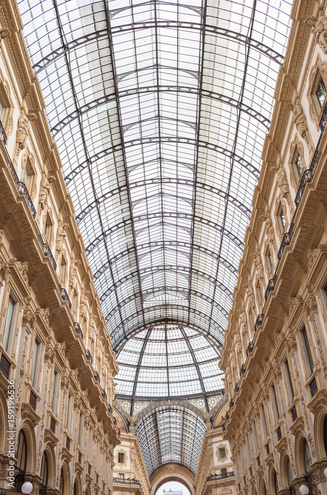 MILAN, ITALY - AUGUST 30, 2016: Luxury Store in Galleria Vittorio Emanuele II shopping mall in Milan. Glass dome of Galleria Vittorio Emanuele