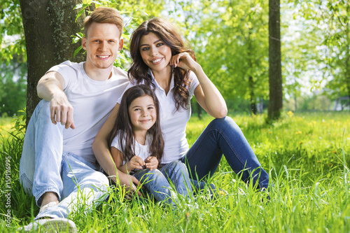 Portrait of happy family in park