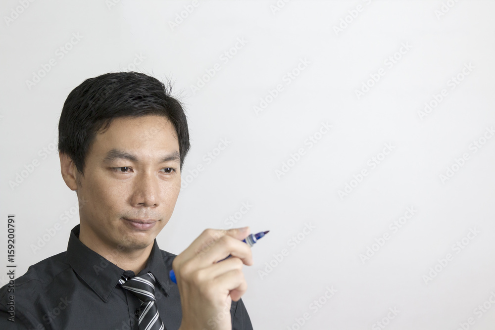 Portrait of Asian Businessman Drawing Something on Transparent Screen. Portrait of Asian Businessman Drawing Something on Transparent Screen.