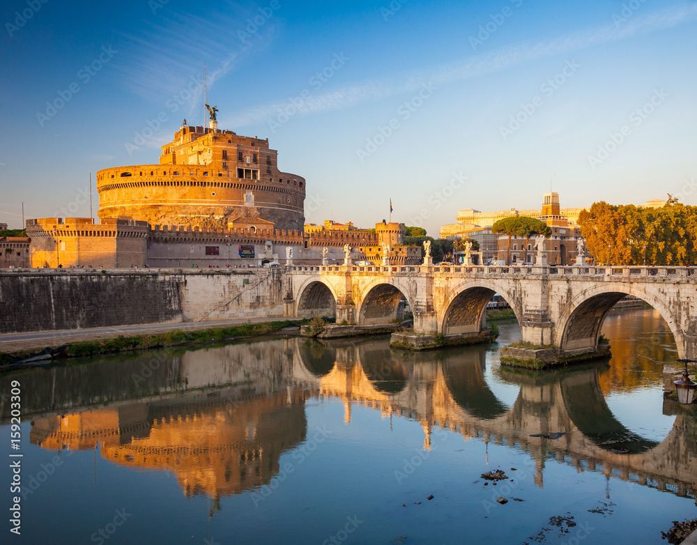 Holy Angel Castle at sunset, Rome, Italy, Europe. Rome ancient tomb of emperor Hadrian. Rome Holy Angel Castle (Castel sant'Angelo) is one fo the best known landmark of Rome and Italy.