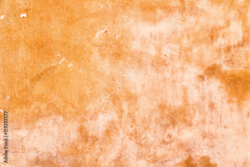 Texture of grunge orange stone wall