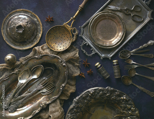 Old kitchen appliances, Vintage cutlery on dark blue background, Top view, Selected focus