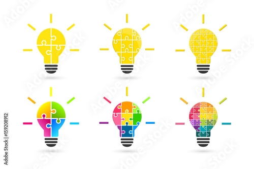 Light bulb made of puzzle pieces as idea concept. Set made of various color and complexity.