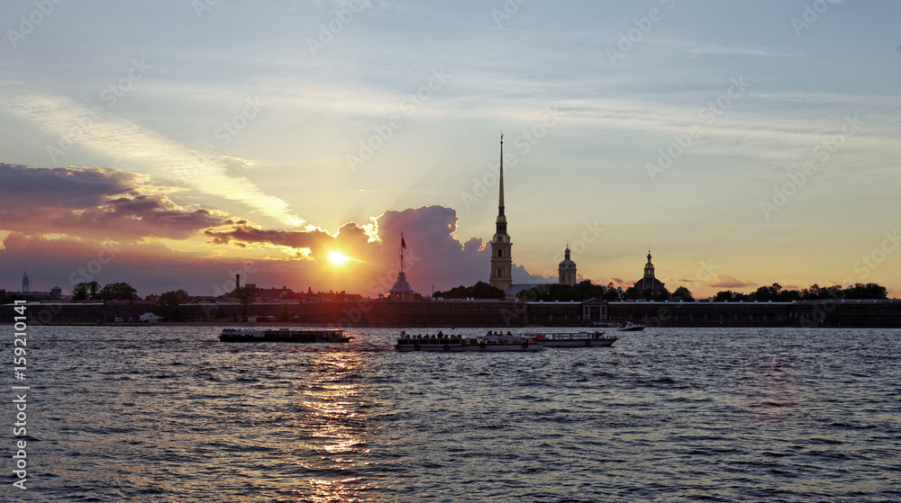 Peter and Paul fortress on Neva river at sunset during the white nights in St. Petersburg, Russia.