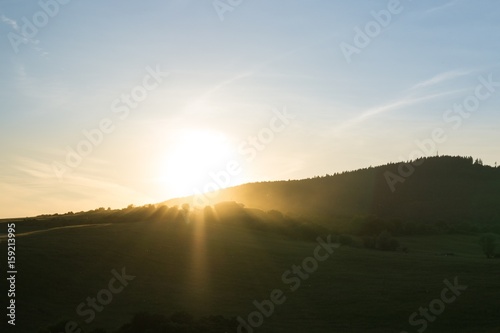 Sunrise and sunset over the hills and town. Slovakia © Valeria
