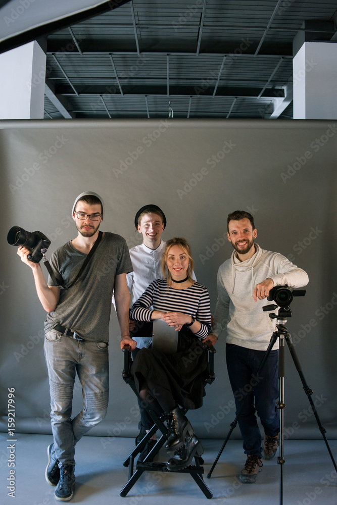 Production team posing in studio interior. Shot of art people looking at  camera at the screen. End of hard work , photo for memory, friendship, crew  concept Stock Photo | Adobe Stock