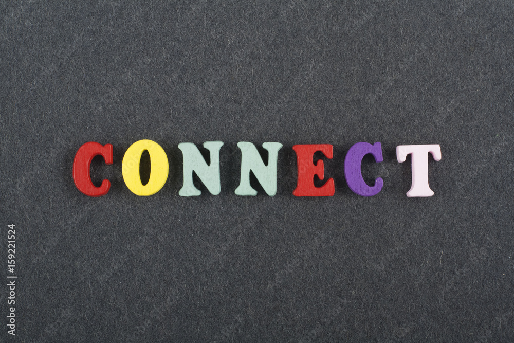 CONNECT word on black board background composed from colorful abc alphabet block wooden letters, copy space for ad text. Learning english concept. CONNECT word on black board background composed from colorful abc alphabet block wooden letters, copy space for ad text. Learning english concept.