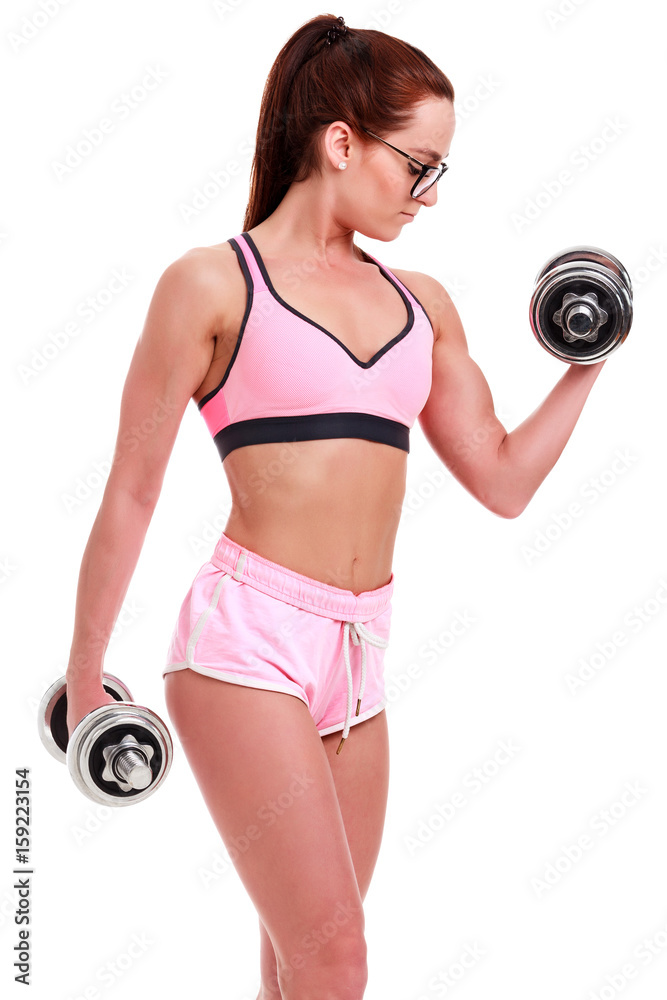 Clever girl in glasses with dumbbells, isolated on clear white background Clever girl in glasses with dumbbells, isolated on clear white background