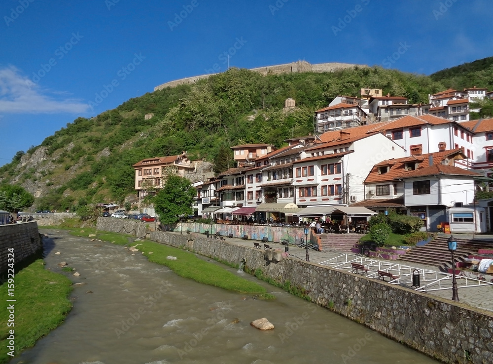 The Prizren Bistrica river flows through Prizren old city centre in a beautiful sunny day, Kosovo 