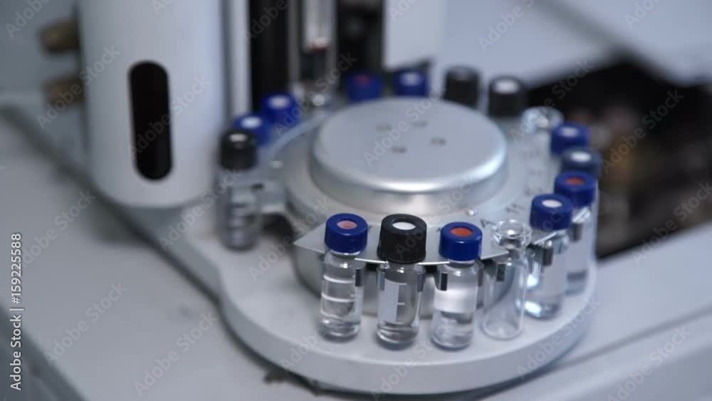 Revolving Container For Lab apparatus with test tubes rotates around axis inside laboratory, small ...