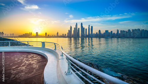 The beauty panorama of skyscrapers in Dubai from promenade at sunrise. UAE photo