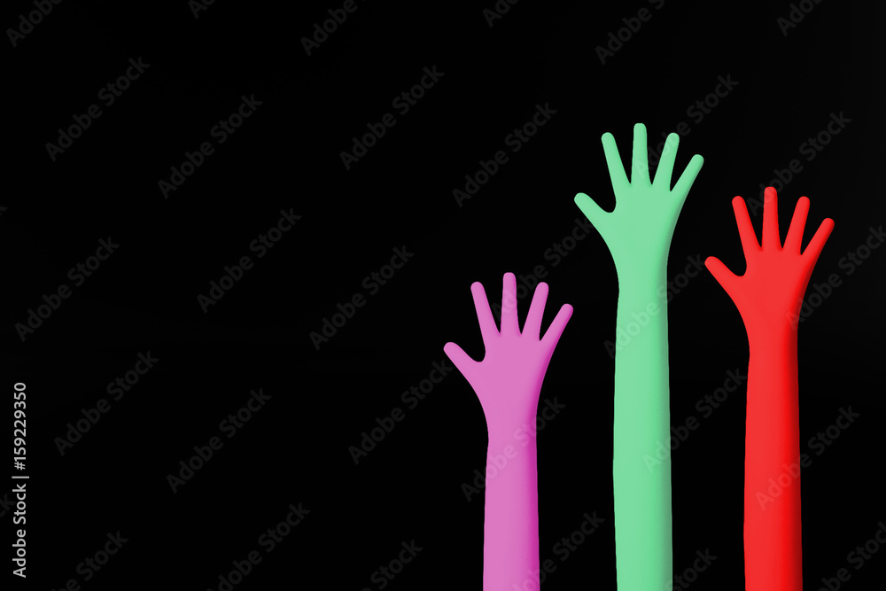 The Colour hands up image closeup