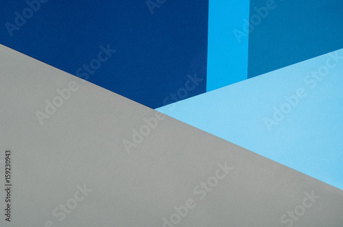 Colorful paper background with texture. Blue colors with copy space for text or graphical elements