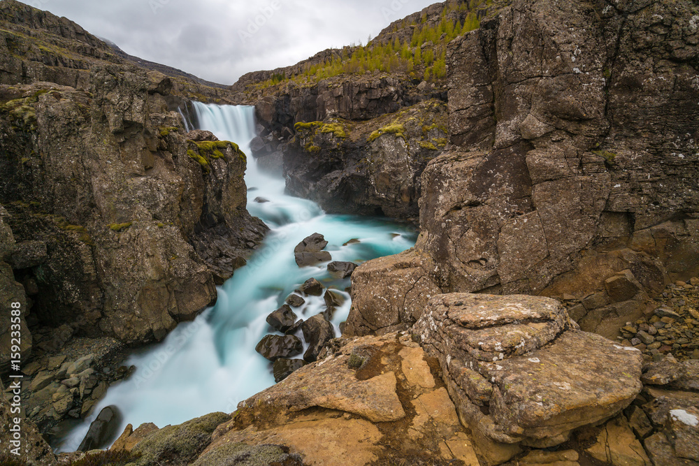 Sveinsstekksfoss waterfall in Eastern Fjords, Iceland