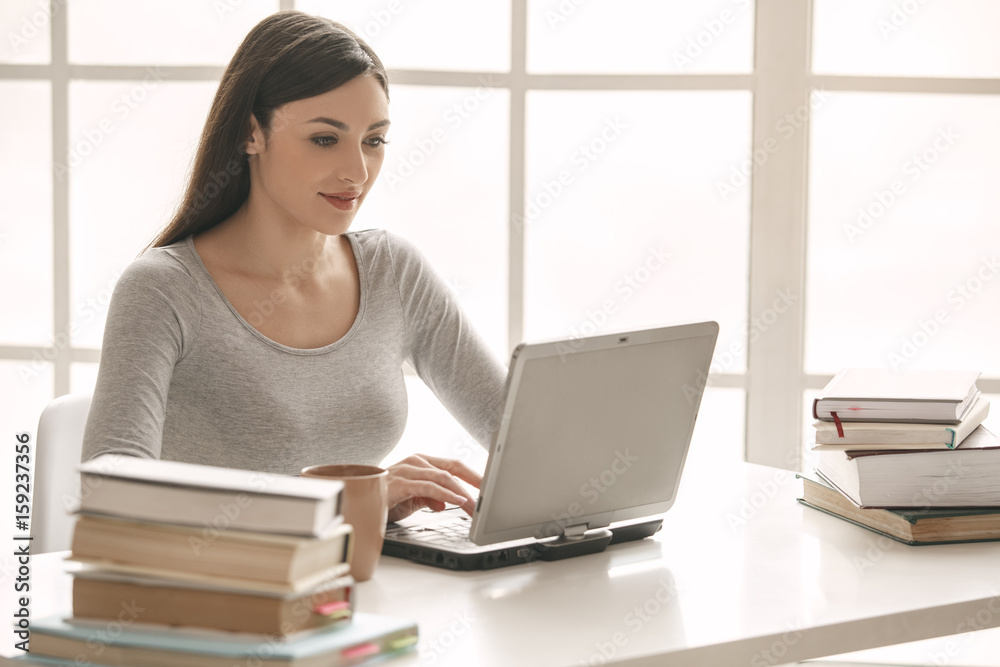 Young woman study at home alone education