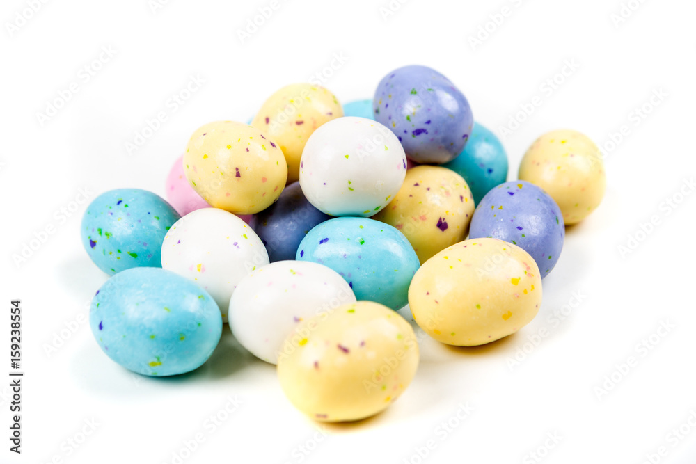 Pastel chocolate malted eggs isolated on a white background Pastel chocolate malted eggs isolated on a white background