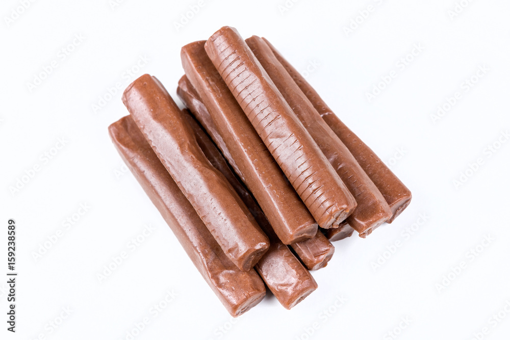 Chewy chocolate logs isolated on a white background Chewy chocolate logs isolated on a white background