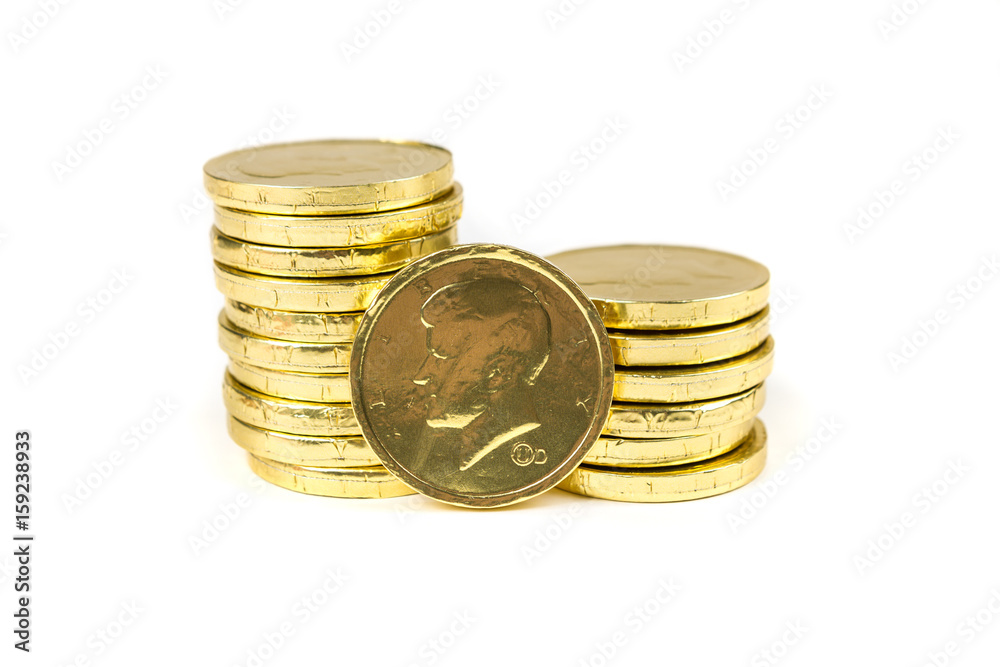 Chocolate gold coins isolated on a white background Chocolate gold coins isolated on a white background