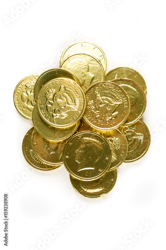 Chocolate gold coins isolated on a white background photo