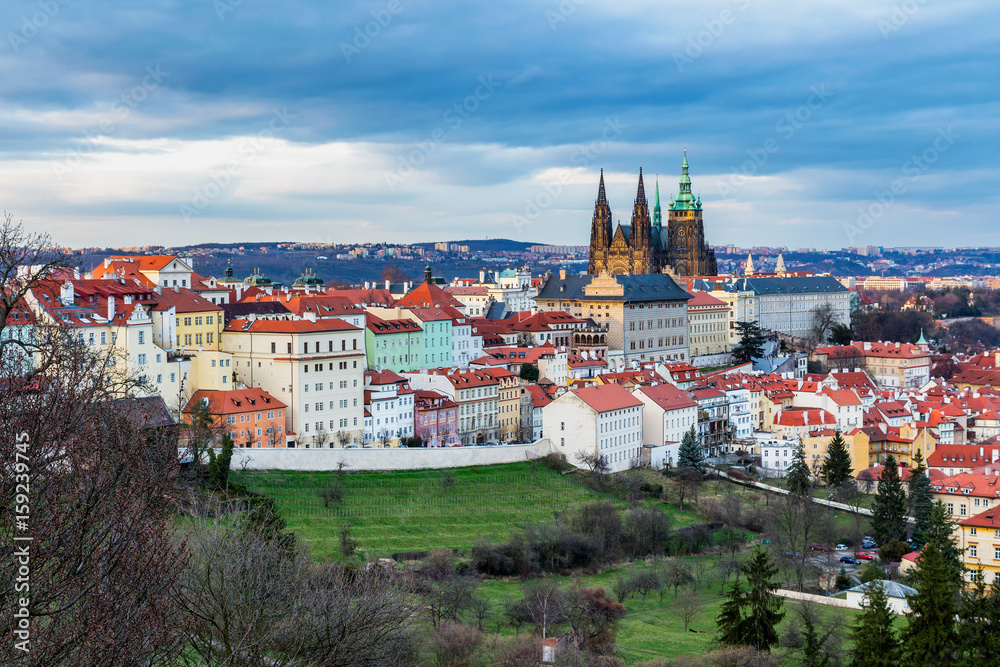 Fototapeta premium Spring Prague panorama from Prague Hill with Prague Castle, Vltava river and historical architecture. Concept of Europe travel, sightseeing and tourism.