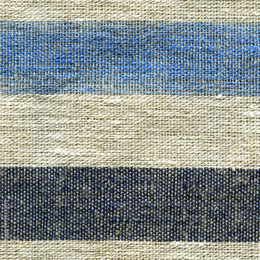 Blue, beige, gray stripe pattern on linen fabric Blue, beige, gray stripe pattern on linen fabric