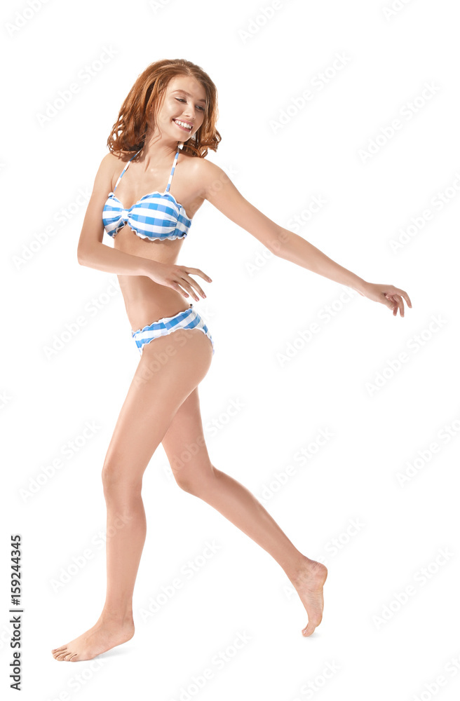 Beautiful young woman in swimsuit on white background Beautiful young woman in swimsuit on white background