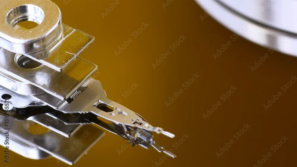 Readwrite head moving on platter. Inside of HDD. Macro shot