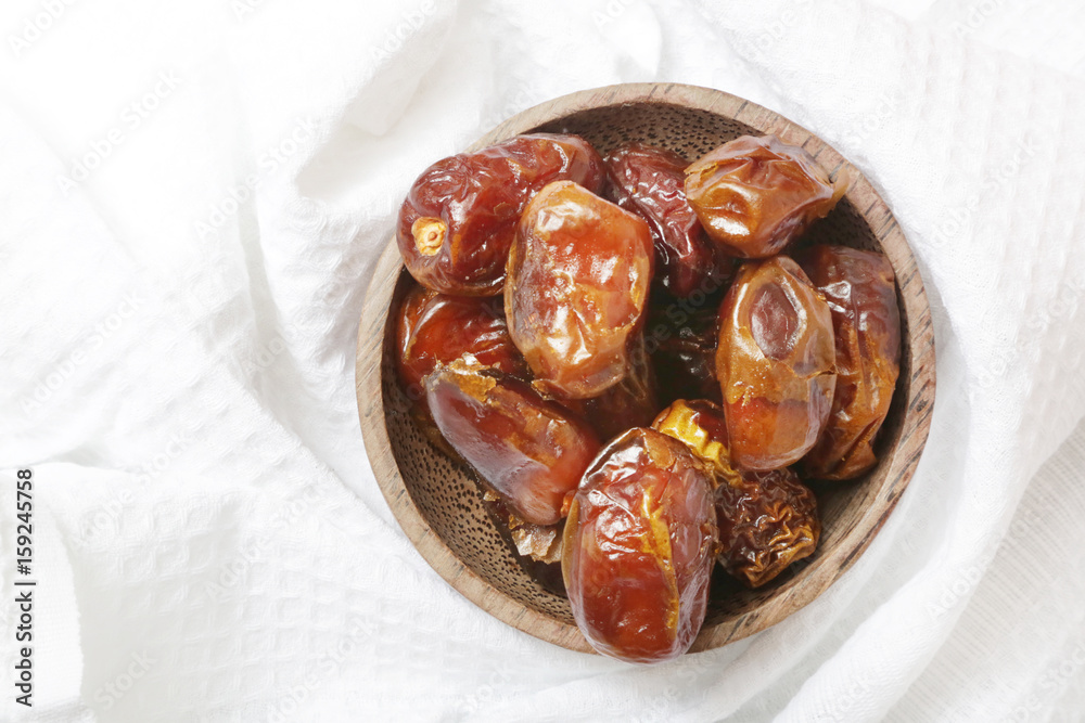 Fototapeta premium Dried dates in small bowl