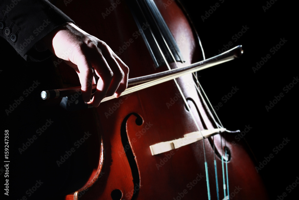Naklejka premium Double bass player Hands playing contrabass