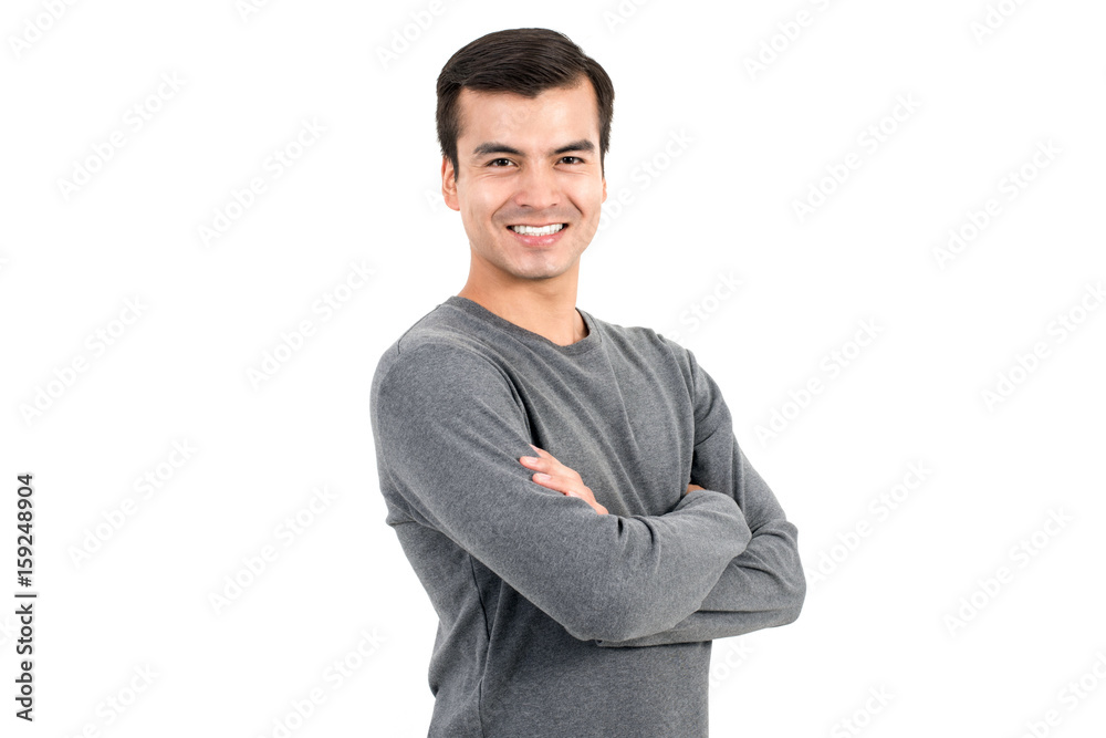 Portrait of happy smiling man wearing casual t-shirt, crossing his arms Portrait of happy smiling man wearing casual t-shirt, crossing his arms