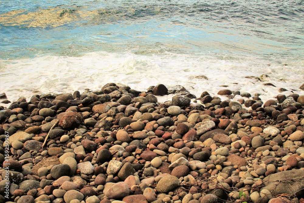 Beautiful blue ocean and a shoreline filled with rocks Beautiful blue ocean and a shoreline filled with rocks