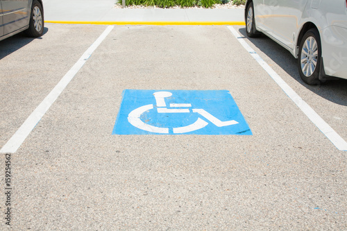 Logos for disabled on parking. handicap parking place sign in boston city.