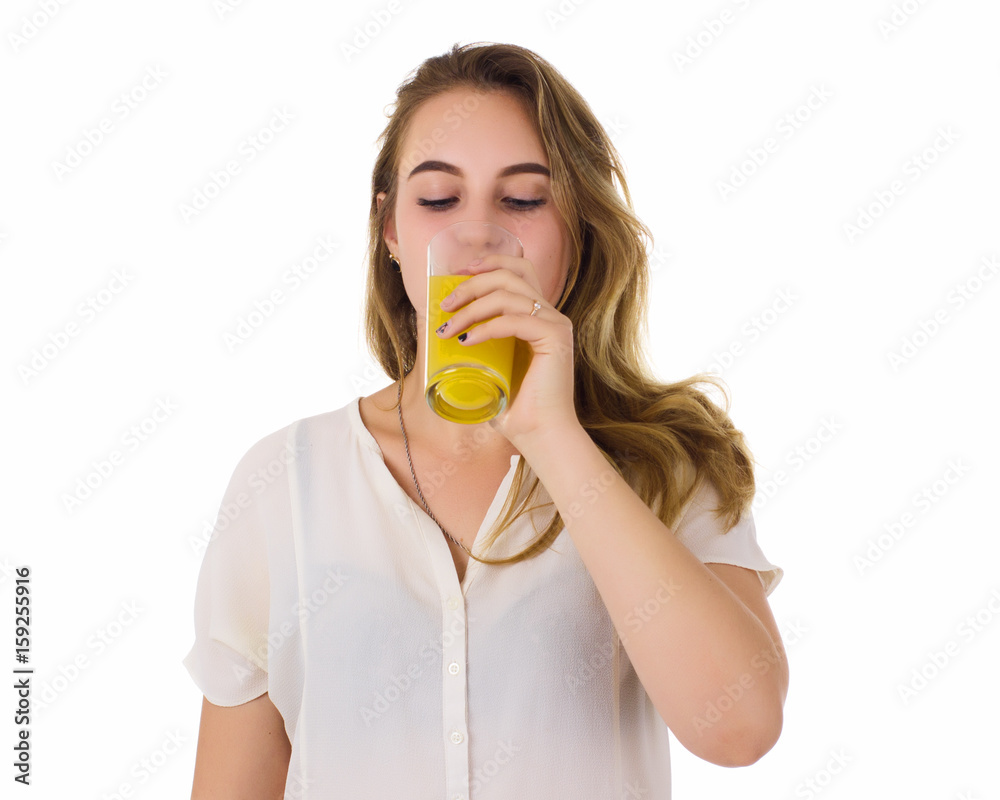 Young pretty girl, orange juice, white background Young pretty girl, orange juice, white background