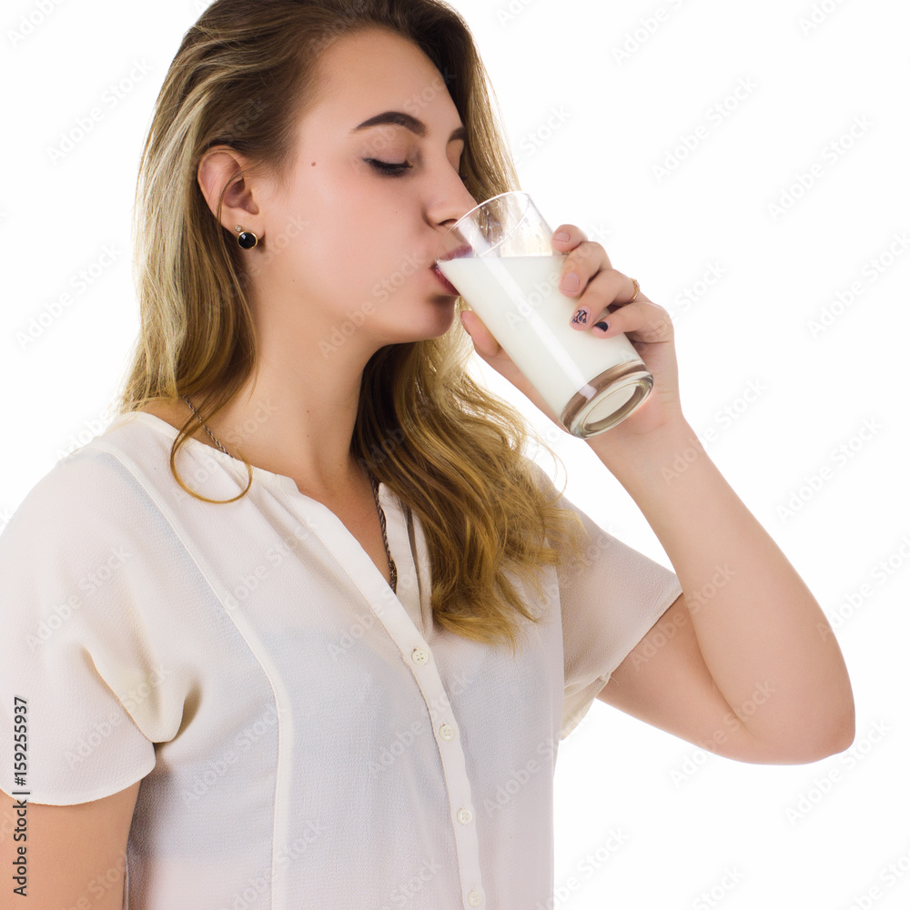 Young pretty girl, glass of milk, white background Young pretty girl, glass of milk, white background