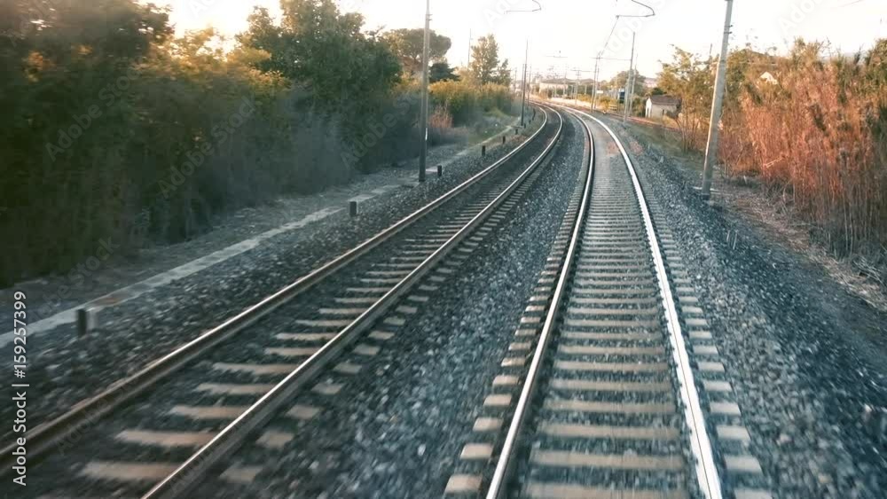 Railroad tracks while the train travels fast. Railroad tracks while the train travels fast.