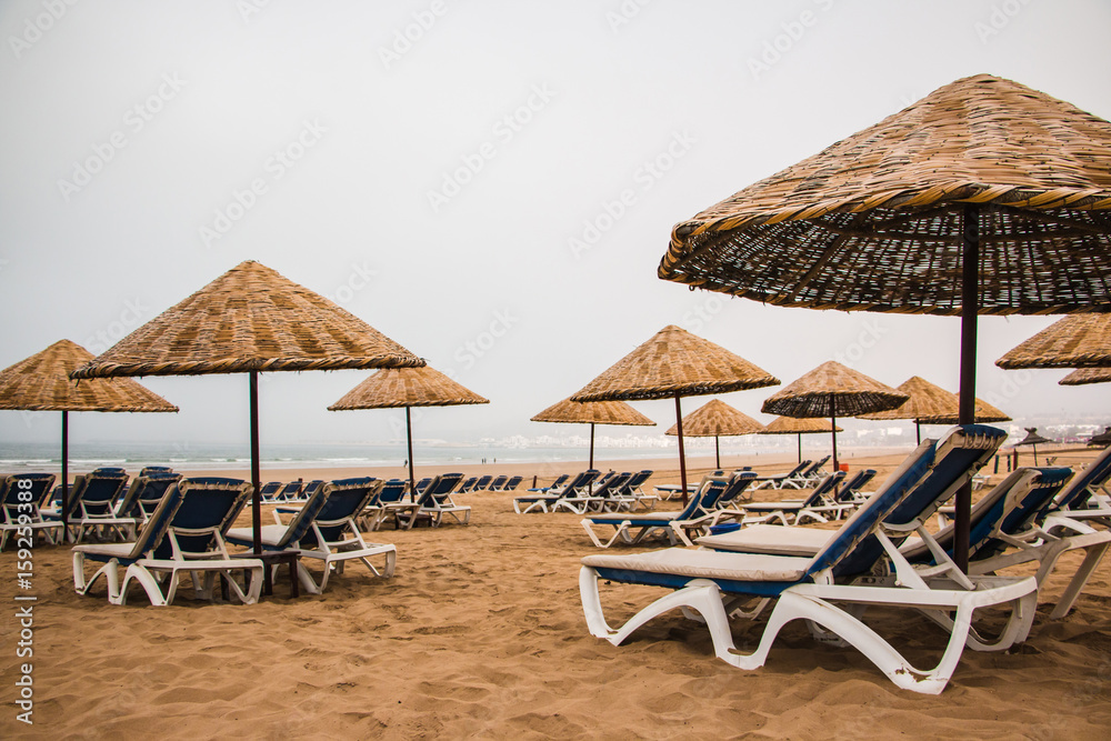 Beach umbrellas on the sandy beach