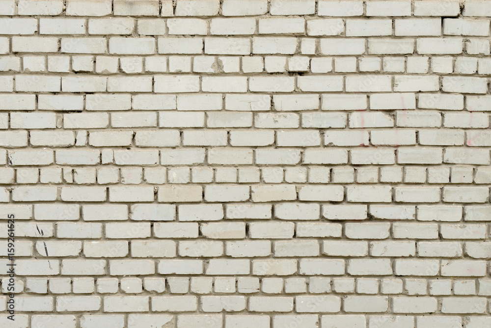 Fototapeta premium Brick texture with scratches and cracks