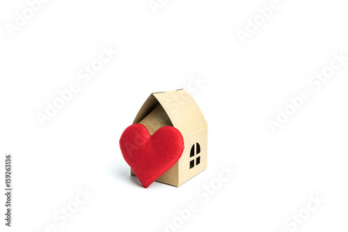 Heart shaped models and house models On a white background © Guitafotostudio