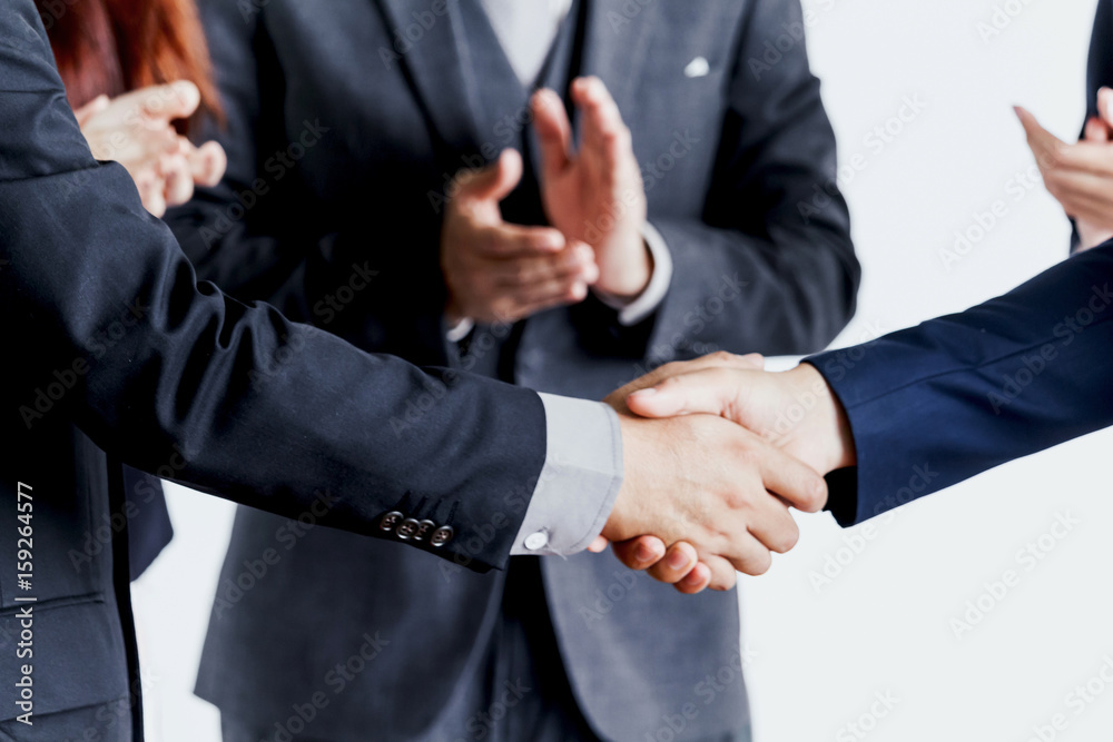 Handshake of business partners Handshake of business partners