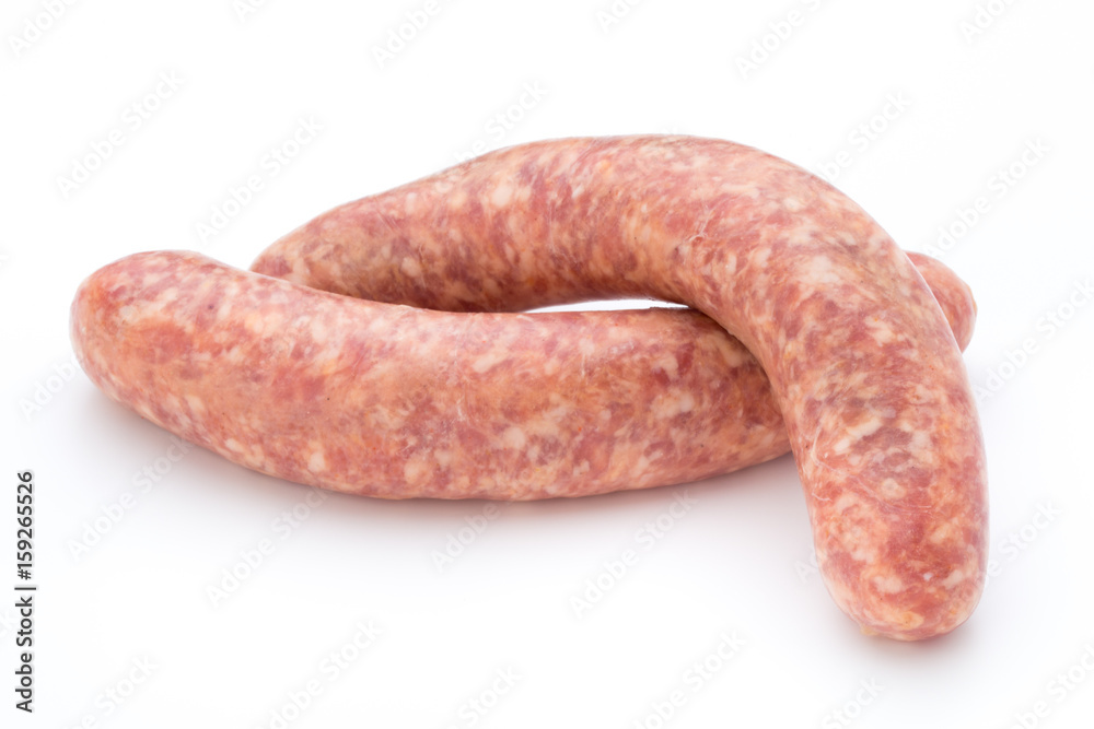 Raw sausage with parsley leaf isolated on white background. Raw sausage with parsley leaf isolated on white background.