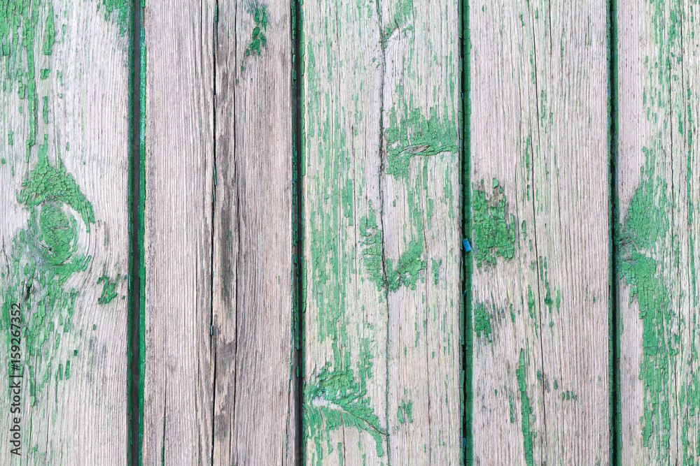 Green painted wood planks as background or texture. Close-up Green painted wood planks as background or texture. Close-up
