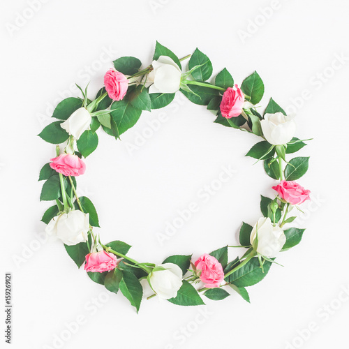 Flowers composition. Frame made of fresh rose flowers. Flat lay, top view