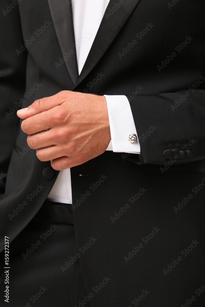 Close-up man in black tuxedo and white shirt